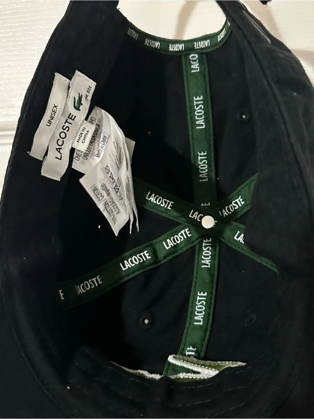 Lacoste Black Cap with Green Branded Interior Taping